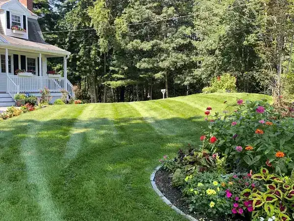Lawn care with flower bed maintenance